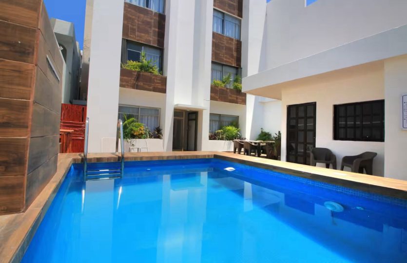 Apartment Building for Sale – Prime Location Steps from 5th Avenue and the Beach