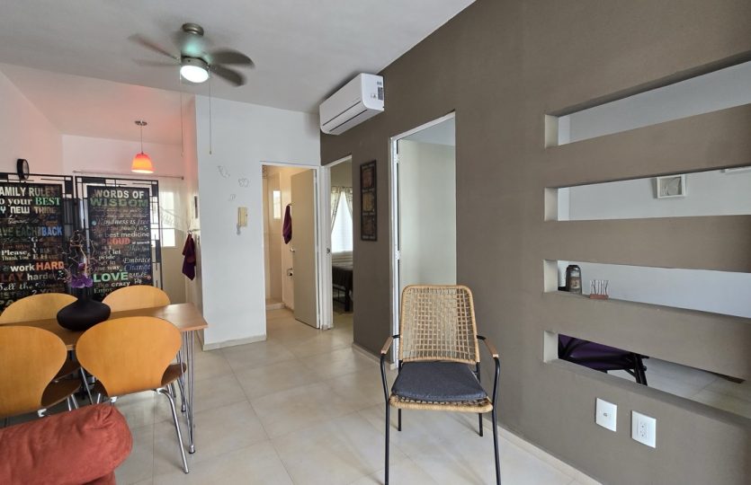 Ground Floor Condo for Sale in Alquería | Turnkey 1BR + Studio with Patio