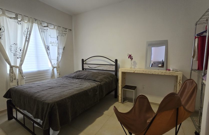 Ground Floor Condo for Sale in Alquería | Turnkey 1BR + Studio with Patio