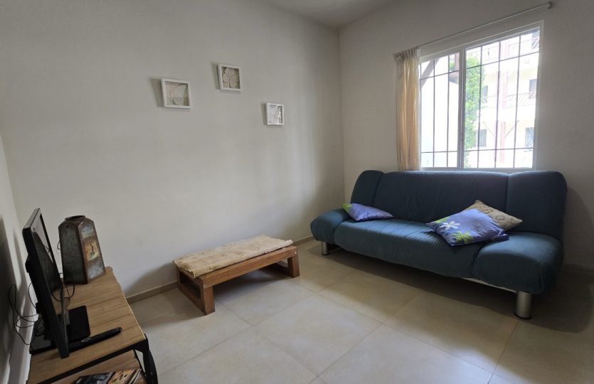 Ground Floor Condo for Sale in Alquería | Turnkey 1BR + Studio with Patio