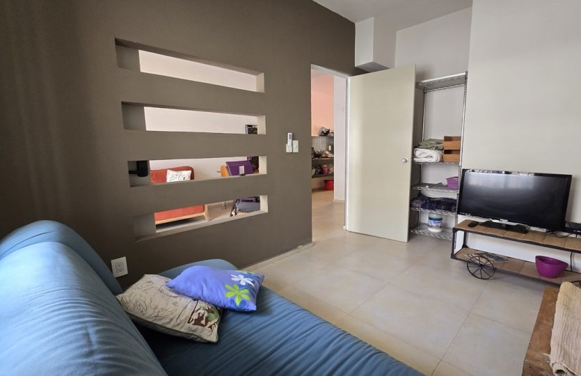 Ground Floor Condo for Sale in Alquería | Turnkey 1BR + Studio with Patio