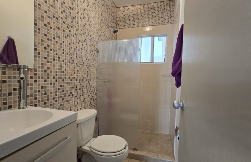 Ground Floor Condo for Sale in Alquería | Turnkey 1BR + Studio with Patio