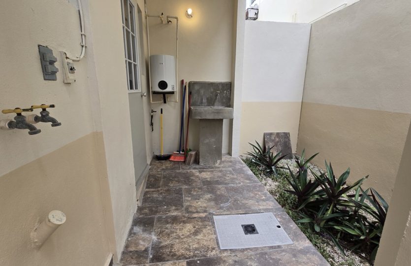 Ground Floor Condo for Sale in Alquería | Turnkey 1BR + Studio with Patio