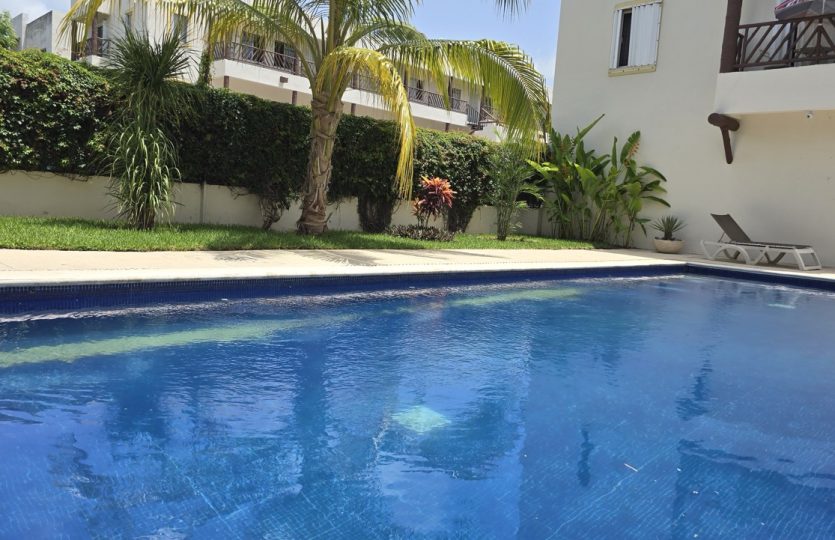 Ground Floor Condo for Sale in Alquería | Turnkey 1BR + Studio with Patio