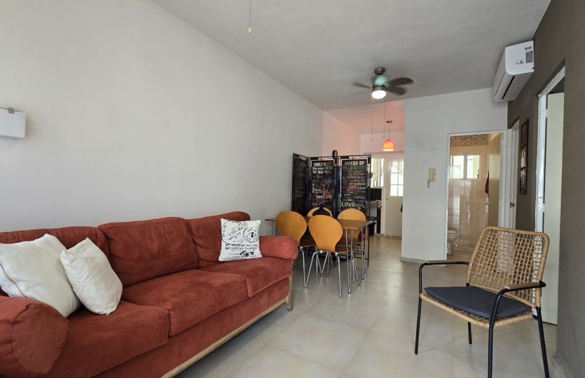 Ground Floor Condo for Sale in Alquería | Turnkey 1BR + Studio with Patio
